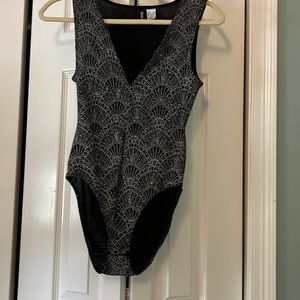 Silver sequined tank body suit. Like new. Worn once